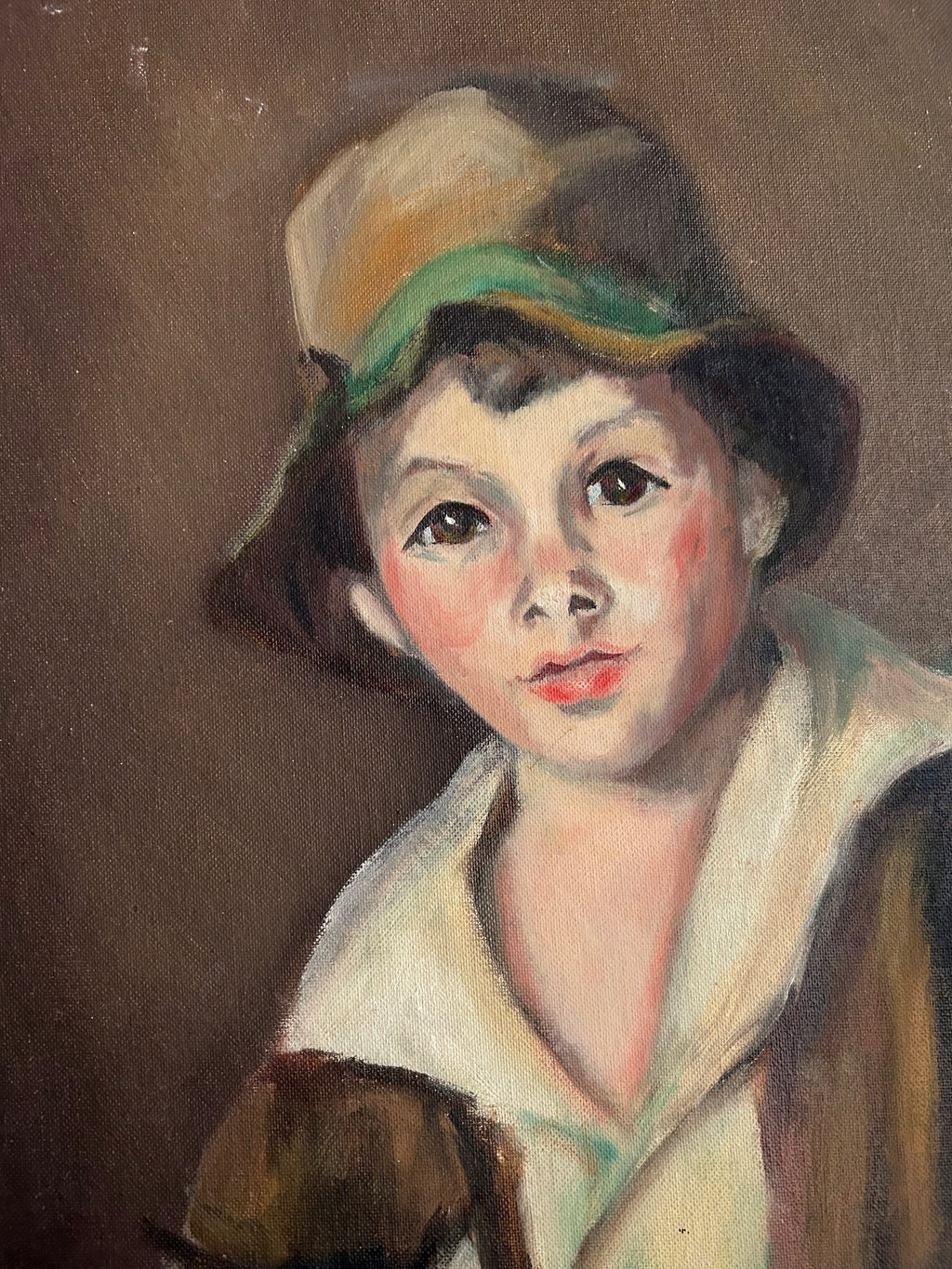 Retrato de mediados de siglo de un niño con un gato, firmado y fechado en 1966